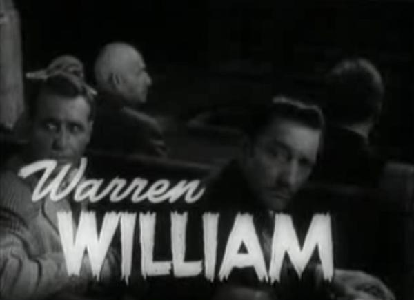 Warren William as Dr Lloyd - Ralph Bellamy at left